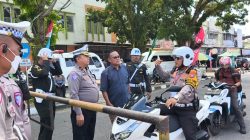 Naik Motor, Dirlantas Polda Riau Jadi Sosok di Balik Lancarnya Pacu Jalur Kuansing 2025