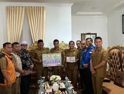Pemerintah Kabupaten Kampar Salurkan Donasi Tunai untuk Korban Bencana di Kabupaten Lima Puluh Kota